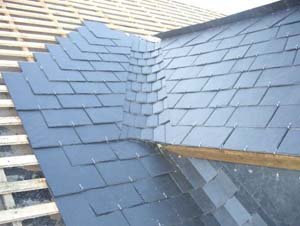 Pose d'ardoises couvreur zingueur Chantilly Lamorlaye La Chapelle en Serval Senlis Creil Gouvieux